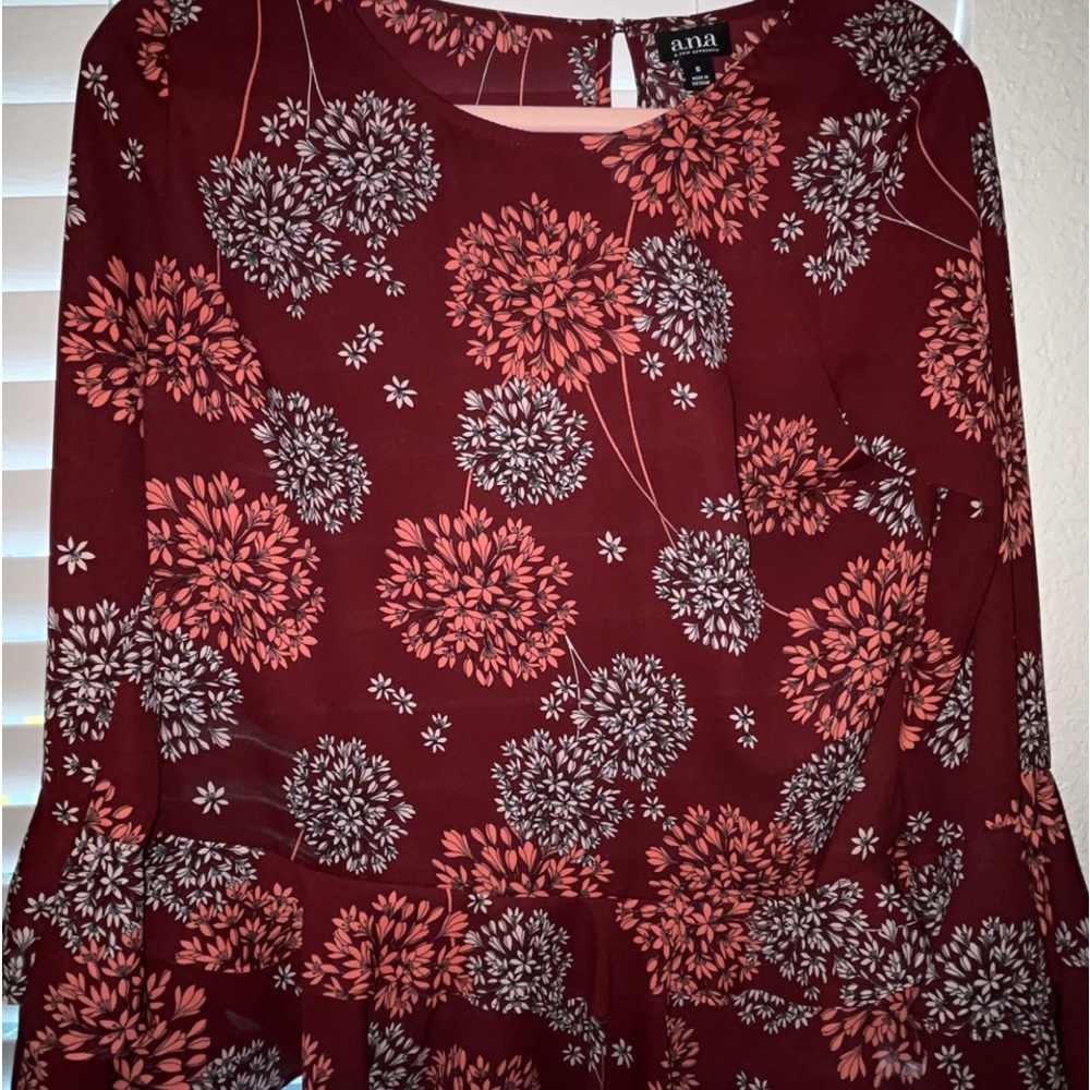 Flowy sheer dress top.